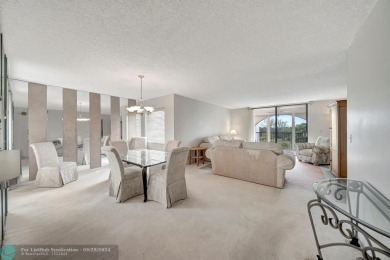 SPACIOUS 2/2 PENTHOUSE CORNER UNIT IN MANICURED 55+ LAKES OF on Inverrary Country Club in Florida - for sale on GolfHomes.com, golf home, golf lot