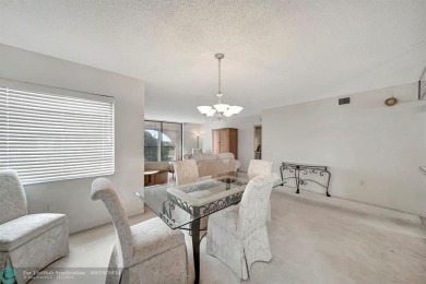SPACIOUS 2/2 PENTHOUSE CORNER UNIT IN MANICURED 55+ LAKES OF on Inverrary Country Club in Florida - for sale on GolfHomes.com, golf home, golf lot