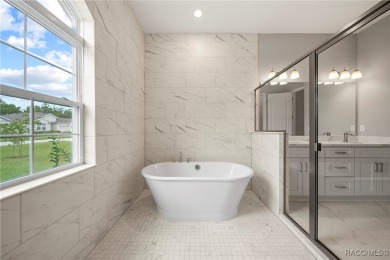 2025 NEW BUILD, this custom updated Genesis Model from Commence on Southern Woods Golf Club in Florida - for sale on GolfHomes.com, golf home, golf lot