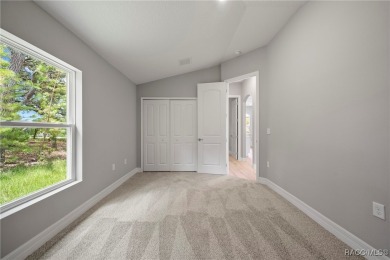 2025 NEW BUILD, this custom updated Genesis Model from Commence on Southern Woods Golf Club in Florida - for sale on GolfHomes.com, golf home, golf lot