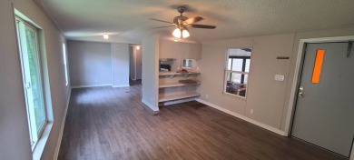 55+/2BD1.5BA/UPDATES/NEW CPVC PLUMBING/NEW VINYL PLANKS/VINYL on Golden Lakes Golf Course in Florida - for sale on GolfHomes.com, golf home, golf lot