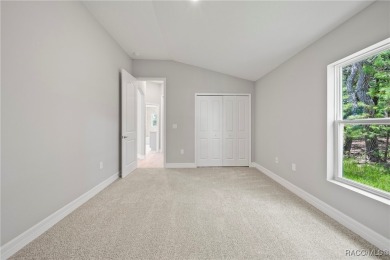 2025 NEW BUILD, this custom updated Genesis Model from Commence on Southern Woods Golf Club in Florida - for sale on GolfHomes.com, golf home, golf lot