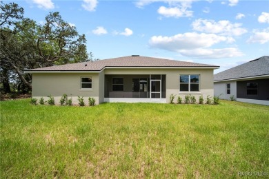 2025 NEW BUILD, this custom updated Genesis Model from Commence on Southern Woods Golf Club in Florida - for sale on GolfHomes.com, golf home, golf lot