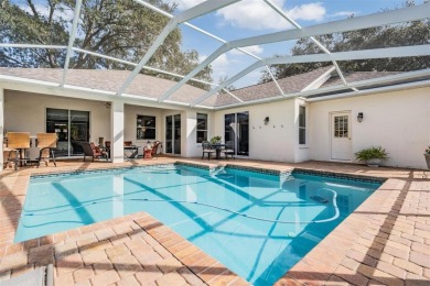 Style and sophistication abound in this Updated Pool Home on Cypress Run Golf Club  in Florida - for sale on GolfHomes.com, golf home, golf lot