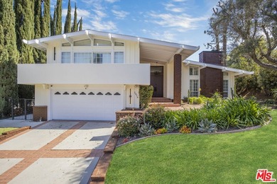 Golf Course & City Views! Perched in a prime Tarzana hillside on Braemar Country Club in California - for sale on GolfHomes.com, golf home, golf lot