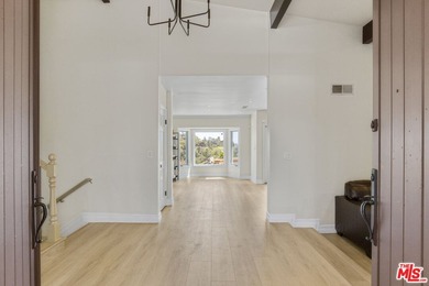 Golf Course & City Views! Perched in a prime Tarzana hillside on Braemar Country Club in California - for sale on GolfHomes.com, golf home, golf lot