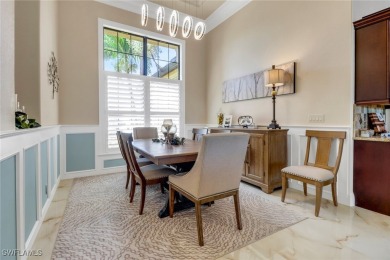 Discover refined Florida living in this stunning TURNKEY on Royal Tee Country Club in Florida - for sale on GolfHomes.com, golf home, golf lot