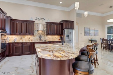 Discover refined Florida living in this stunning TURNKEY on Royal Tee Country Club in Florida - for sale on GolfHomes.com, golf home, golf lot