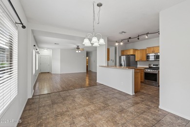 Exceptional move-in ready home in the premier Johnson Ranch on The Golf Club At Johnson Ranch in Arizona - for sale on GolfHomes.com, golf home, golf lot