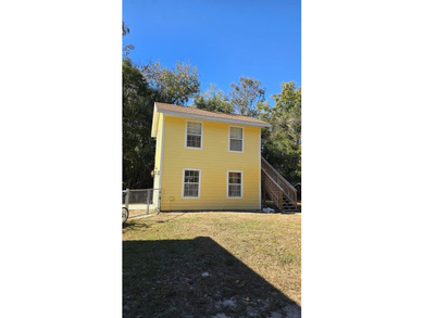 4BR/3BA CUSTOM HOME ON 1 ACRE | BUCK BAY SUBDIVISION. Just on Chiefland Golf and Country Club in Florida - for sale on GolfHomes.com, golf home, golf lot