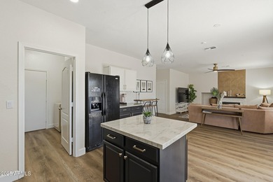 Welcome to this stunning and spacious 3-bedroom, 2.5-bath home on The Golf Club At Johnson Ranch in Arizona - for sale on GolfHomes.com, golf home, golf lot
