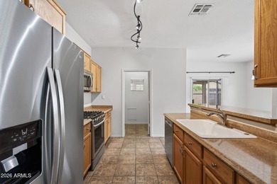 Exceptional move-in ready home in the premier Johnson Ranch on The Golf Club At Johnson Ranch in Arizona - for sale on GolfHomes.com, golf home, golf lot