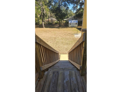 4BR/3BA CUSTOM HOME ON 1 ACRE | BUCK BAY SUBDIVISION. Just on Chiefland Golf and Country Club in Florida - for sale on GolfHomes.com, golf home, golf lot