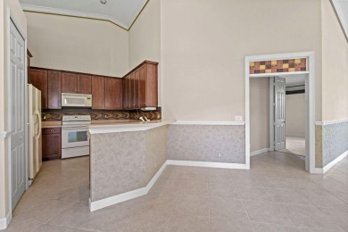 Beautifully updated 2-bedroom, 2-bath, 1-car garage villa with a on The Legacy Golf and Tennis Club in Florida - for sale on GolfHomes.com, golf home, golf lot