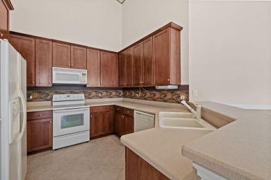 Beautifully updated 2-bedroom, 2-bath, 1-car garage villa with a on The Legacy Golf and Tennis Club in Florida - for sale on GolfHomes.com, golf home, golf lot