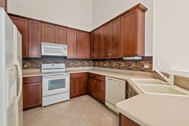Beautifully updated 2-bedroom, 2-bath, 1-car garage villa with a on The Legacy Golf and Tennis Club in Florida - for sale on GolfHomes.com, golf home, golf lot
