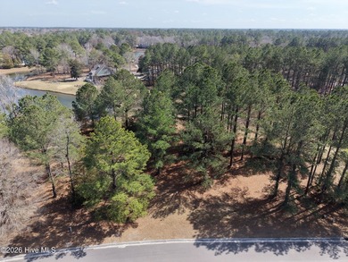 A must-see, beautiful 0.30-acre wooded homesite located in the on River Landing Golf Course in North Carolina - for sale on GolfHomes.com, golf home, golf lot