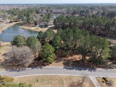 A must-see, beautiful 0.30-acre wooded homesite located in the on River Landing Golf Course in North Carolina - for sale on GolfHomes.com, golf home, golf lot