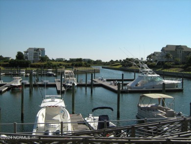Lovely half acre lot in Seascape backing up to natural area on Lockwood Folly Country Club in North Carolina - for sale on GolfHomes.com, golf home, golf lot