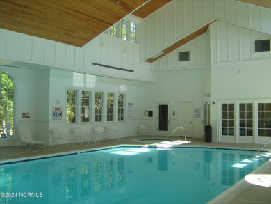 Lovely half acre lot in Seascape backing up to natural area on Lockwood Folly Country Club in North Carolina - for sale on GolfHomes.com, golf home, golf lot