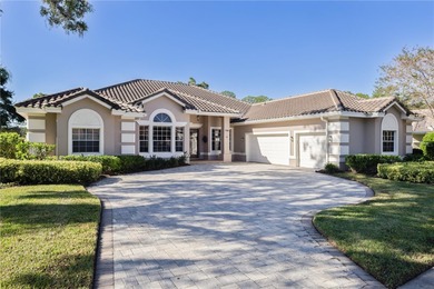 This executive pool home is located on a quiet cul de sac street on Heathrow Country Club in Florida - for sale on GolfHomes.com, golf home, golf lot