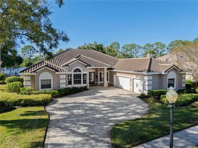 This executive pool home is located on a quiet cul de sac street on Heathrow Country Club in Florida - for sale on GolfHomes.com, golf home, golf lot