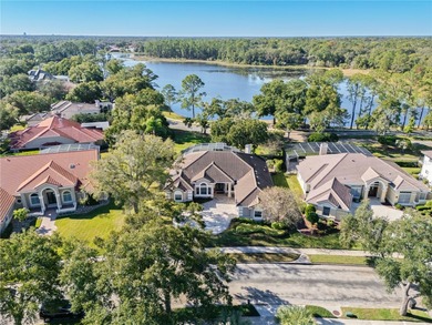 This executive pool home is located on a quiet cul de sac street on Heathrow Country Club in Florida - for sale on GolfHomes.com, golf home, golf lot