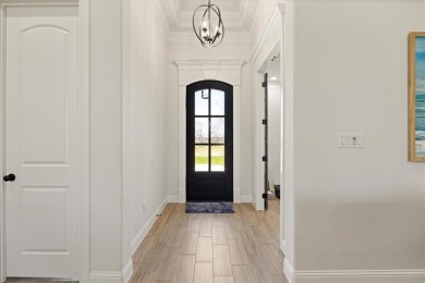 2025 like-new Coutto home with stunning interior features on Nutcracker Golf Club in Texas - for sale on GolfHomes.com, golf home, golf lot