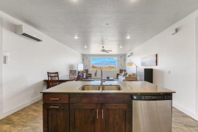 This resort offers a stunning 18 hole Golf Course, emerald green on Sand Hollow Golf Resort in Utah - for sale on GolfHomes.com, golf home, golf lot