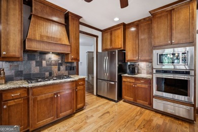 Elegant Four-Sided Brick Home on Golf Course Cul-de-Sac with on Traditions of Braselton Golf Club in Georgia - for sale on GolfHomes.com, golf home, golf lot