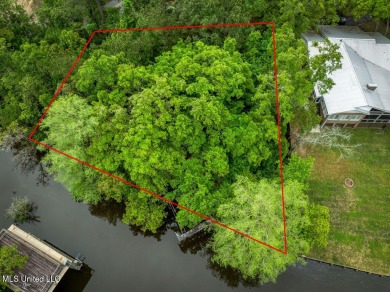 Gulf Hills Waterfront .44 acre lot. Neighborhood amenities on Gulf Hills Golf Club in Mississippi - for sale on GolfHomes.com, golf home, golf lot