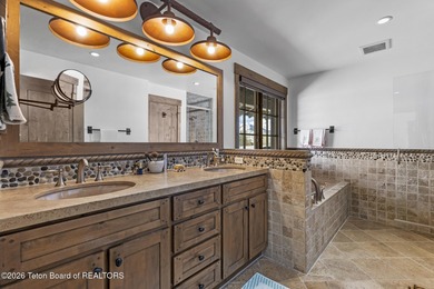 This charming home is a great opportunity to own in the Cabins on Jackson Hole Golf and Tennis Club in Wyoming - for sale on GolfHomes.com, golf home, golf lot