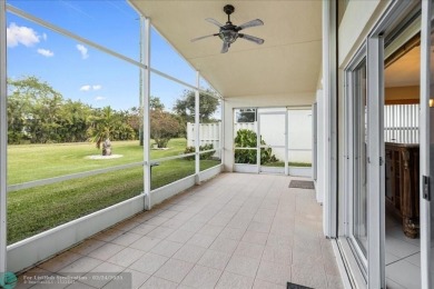 Welcome to this stunning home in a gated community and golfer's on Westchester Golf and Country Club in Florida - for sale on GolfHomes.com, golf home, golf lot