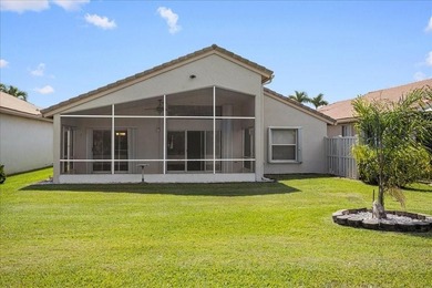 Welcome to this stunning home in a gated community and golfer's on Westchester Golf and Country Club in Florida - for sale on GolfHomes.com, golf home, golf lot