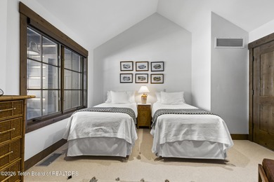 This charming home is a great opportunity to own in the Cabins on Jackson Hole Golf and Tennis Club in Wyoming - for sale on GolfHomes.com, golf home, golf lot