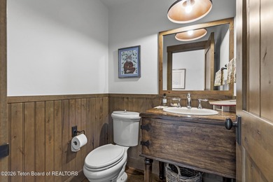 This charming home is a great opportunity to own in the Cabins on Jackson Hole Golf and Tennis Club in Wyoming - for sale on GolfHomes.com, golf home, golf lot