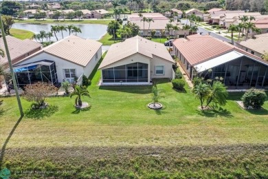 Welcome to this stunning home in a gated community and golfer's on Westchester Golf and Country Club in Florida - for sale on GolfHomes.com, golf home, golf lot