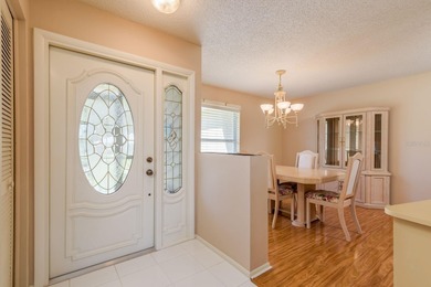 Welcome to this beautifully maintained 3-bedroom, 2-bath on Highland Lakes Executive Golf Course in Florida - for sale on GolfHomes.com, golf home, golf lot