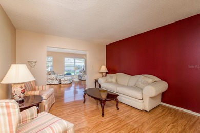 Welcome to this beautifully maintained 3-bedroom, 2-bath on Highland Lakes Executive Golf Course in Florida - for sale on GolfHomes.com, golf home, golf lot