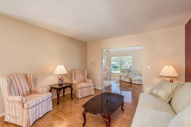 Welcome to this beautifully maintained 3-bedroom, 2-bath on Highland Lakes Executive Golf Course in Florida - for sale on GolfHomes.com, golf home, golf lot