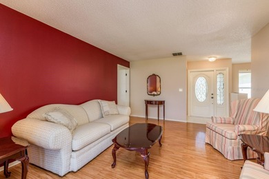 Welcome to this beautifully maintained 3-bedroom, 2-bath on Highland Lakes Executive Golf Course in Florida - for sale on GolfHomes.com, golf home, golf lot