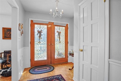 This 4-bed 3 bathroom home in Longwood offers multi-generational on Rolling Hills Golf Club in Florida - for sale on GolfHomes.com, golf home, golf lot