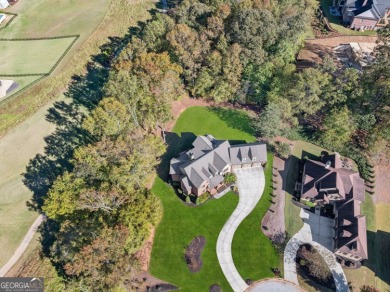 Elegant Four-Sided Brick Home on Golf Course Cul-de-Sac with on Traditions of Braselton Golf Club in Georgia - for sale on GolfHomes.com, golf home, golf lot