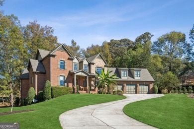 Elegant Four-Sided Brick Home on Golf Course Cul-de-Sac with on Traditions of Braselton Golf Club in Georgia - for sale on GolfHomes.com, golf home, golf lot