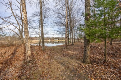 Rare Find!  Over 1 acre + 200' Waterfrontage on Fawn Lake on Canadian Lakes Country Club-The Royal Course in Michigan - for sale on GolfHomes.com, golf home, golf lot