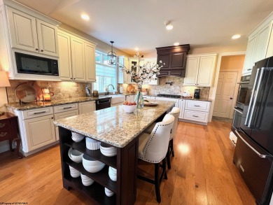 Experience single-level, luxury living at the recently renovated on Mountain View Golf Course in West Virginia - for sale on GolfHomes.com, golf home, golf lot