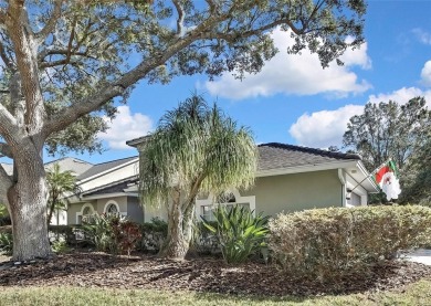 CHARMING SINGLE STORY HOME SITUATED ON AN OVERSIZED CONSERVATION on TPC of Tampa Bay in Florida - for sale on GolfHomes.com, golf home, golf lot