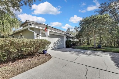 CHARMING SINGLE STORY HOME SITUATED ON AN OVERSIZED CONSERVATION on TPC of Tampa Bay in Florida - for sale on GolfHomes.com, golf home, golf lot