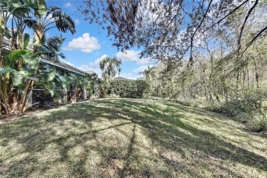 CHARMING SINGLE STORY HOME SITUATED ON AN OVERSIZED CONSERVATION on TPC of Tampa Bay in Florida - for sale on GolfHomes.com, golf home, golf lot