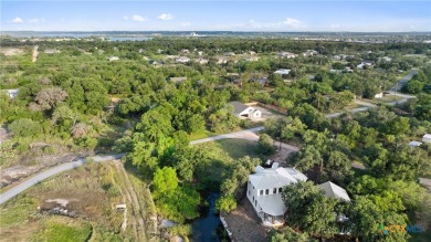 Lake living awaits you! Discover this rare find: a waterfront on Blue Lake Golf Club in Texas - for sale on GolfHomes.com, golf home, golf lot